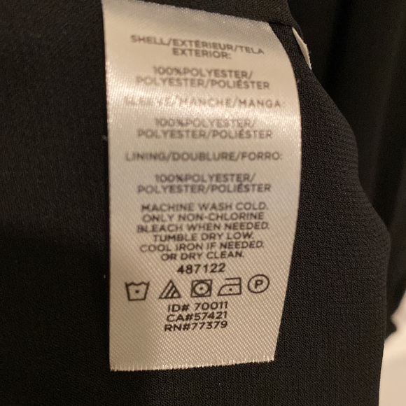 Black dress Bow detail on shoulder. Sheer sleeves. - Picture 5 of 5